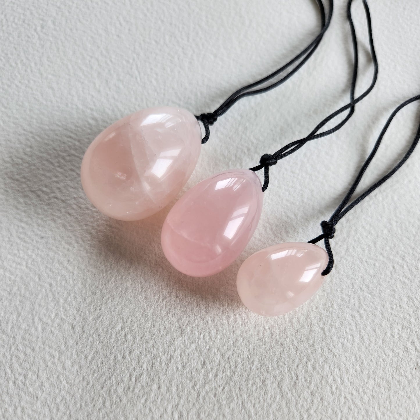 Yoni Eggs on a white surface