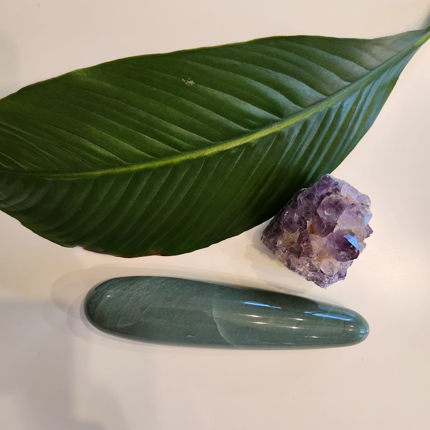 Large straight Crystal Wand Yoni shape in a green aventurine color for the Yoni pleasure