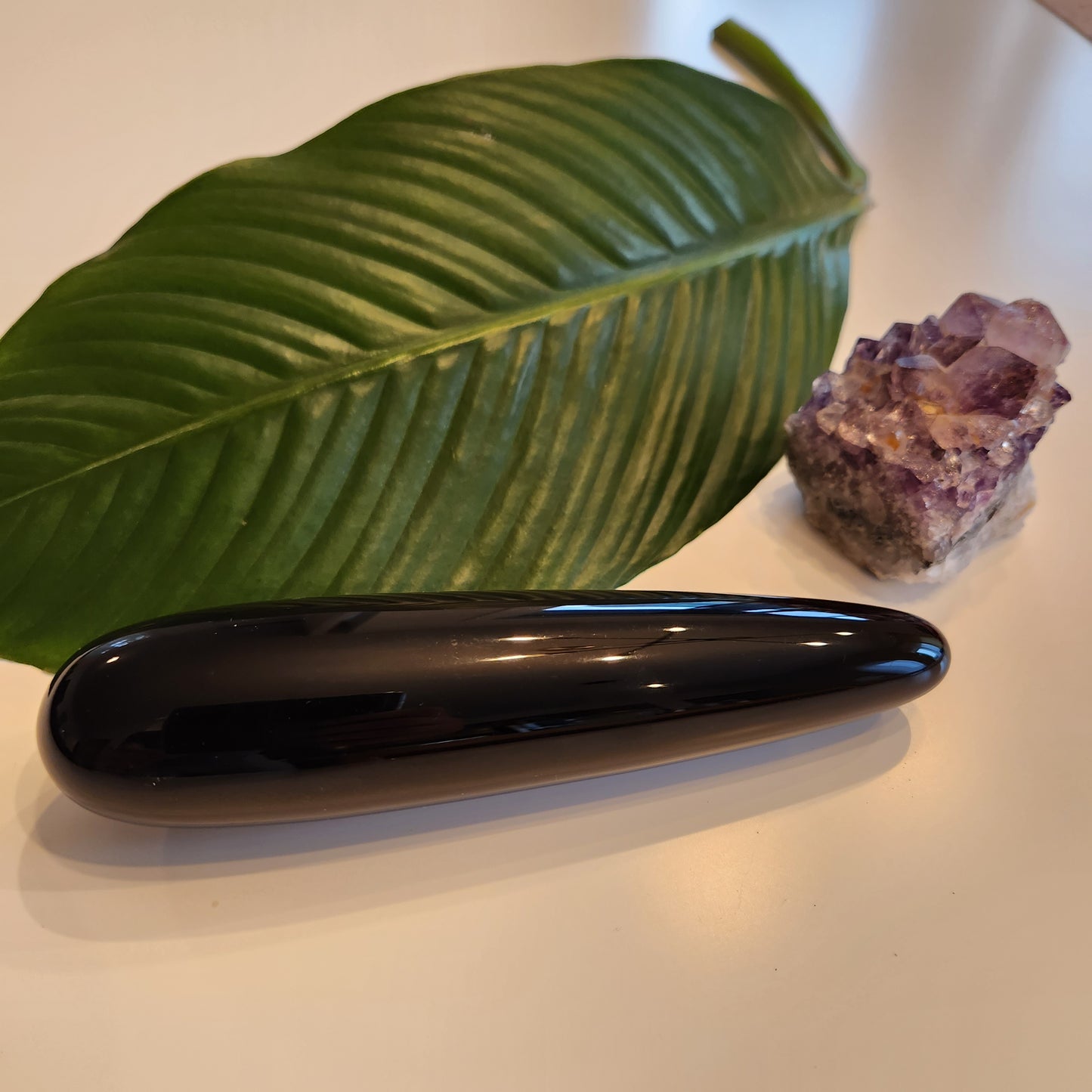 Large straight black obsidian yoni wand for well-being and transformation