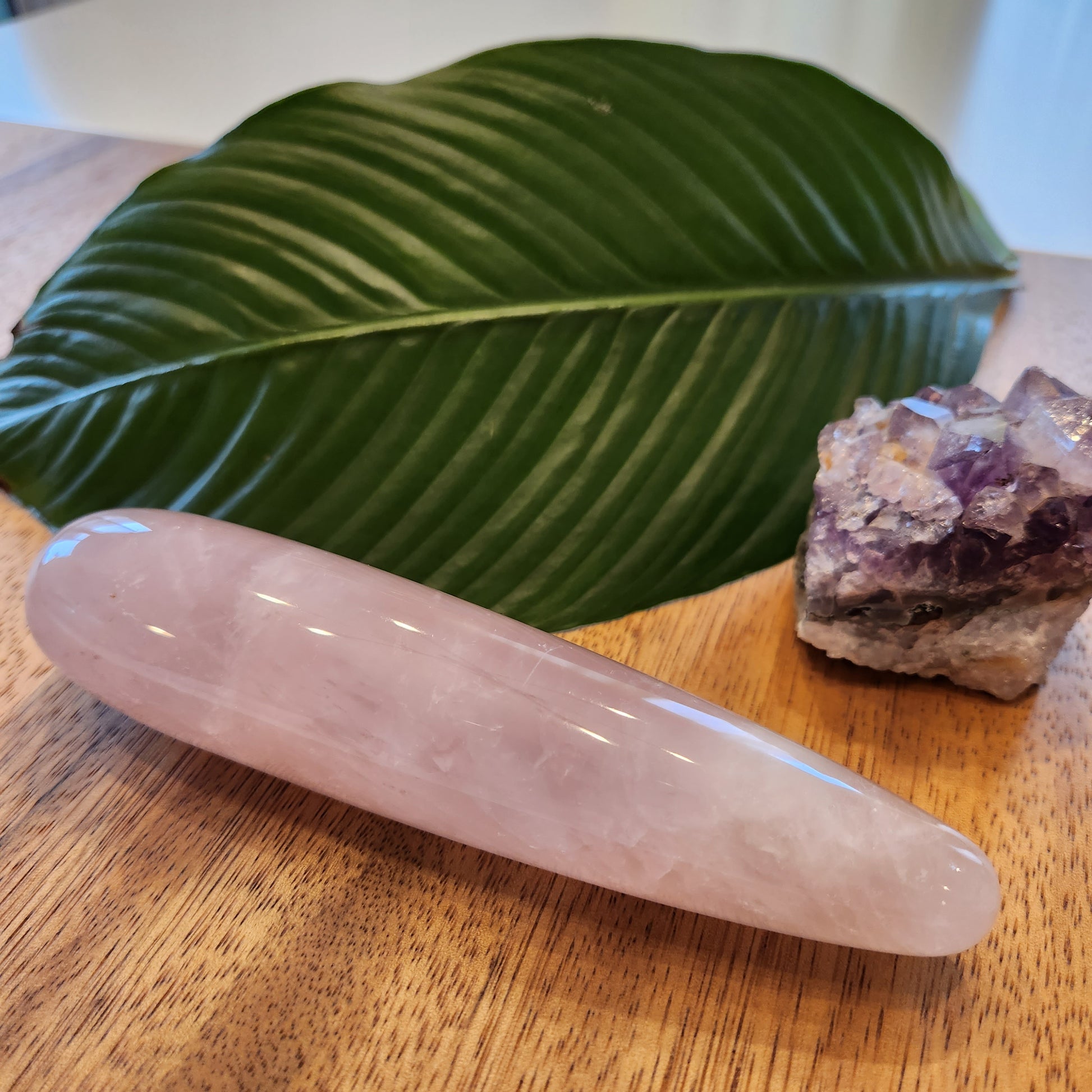 Large straight Crystal Wand Yoni shape in a Rose quartz color for the Yoni pleasure