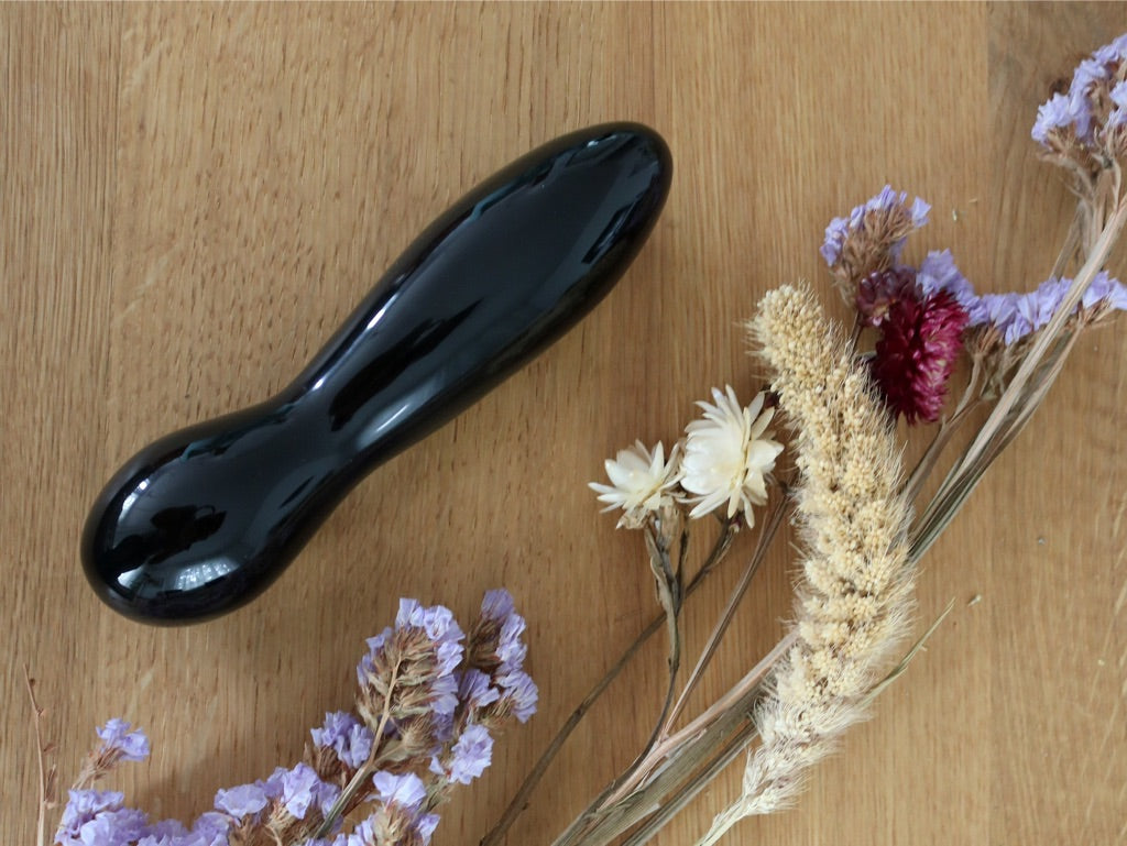 Beautiful black obsidian crystal wand with large curved shape