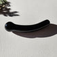 Ergonomically shaped black obsidian crystal wand for grounding and protection