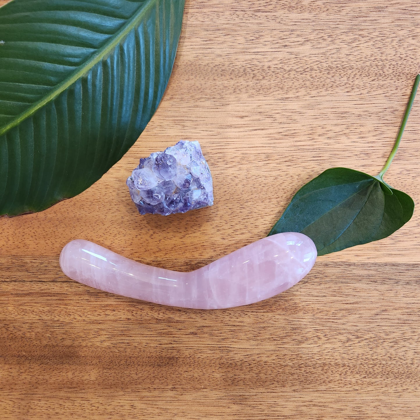 Dual-size rose quartz curved yoni wand for nurturing and well-being